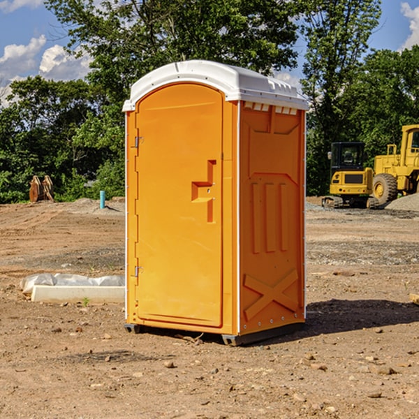 how often are the portable restrooms cleaned and serviced during a rental period in New Bern